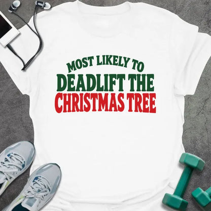 White t-shirt printed with "MOST LIKELY TO DEADLIFT THE CHRISTMAS TREE" in green and red