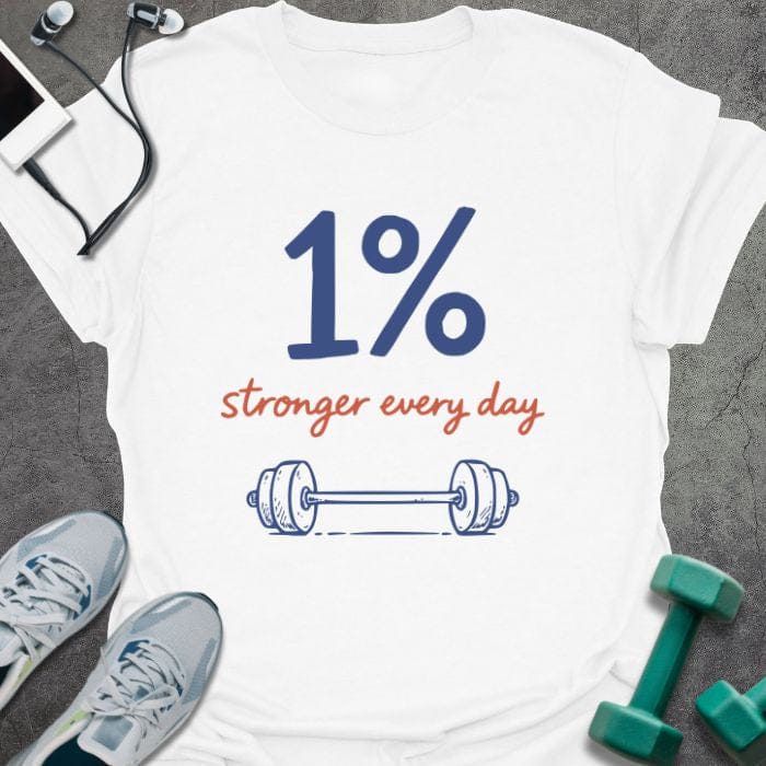 White t-shirt printed with "1% stronger every day" in blue and red, with dumbbell illustration