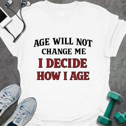 White t-shirt printed with "Age Will Not Change Me I Decide How I Age" in red
