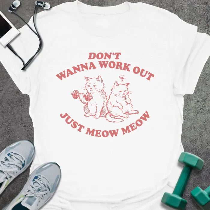 White t-shirt printed with "Don't Wanna Work Out Just Meow Meow" in pink, with an illustration of two cats