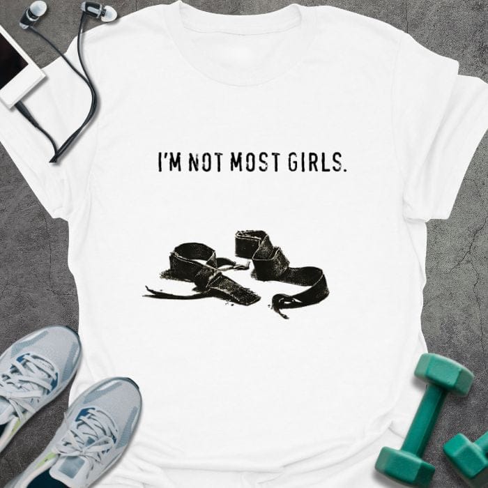 White t-shirt printed with "I'm Not Most Girls.", with lifting straps