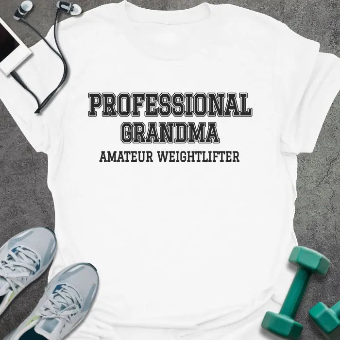 White t-shirt printed with "PROFESSIONAL GRANDMA, AMATEUR WEIGHTLIFTER" in charcoal varsity letters
