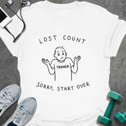 White t-shirt printed with "Lost Count Sorry, Start Over", with stick figure with raised arms