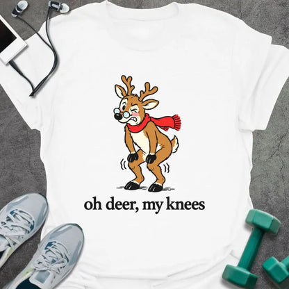 White t-shirt printed with "oh deer, my knees" in black, with a vintage cartoon reindeer in glasses and a red scarf holding its knees