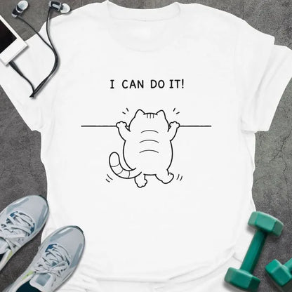 White t-shirt printed with "I CAN DO IT!" in black, with cat attempting pullup