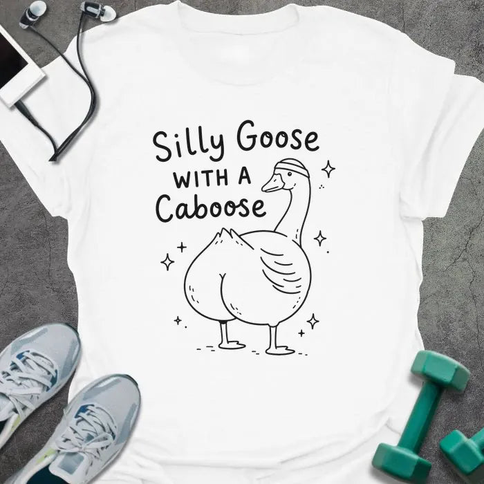 White t-shirt printed with "Silly Goose WITH A Caboose" in black, with goose with sparkles