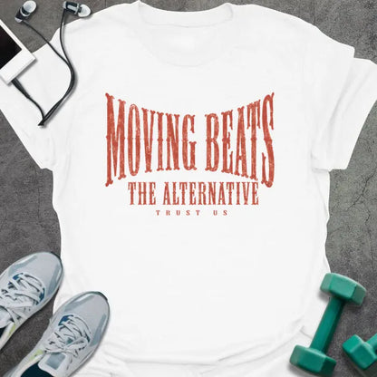 White t-shirt printed with "MOVING BEATS THE ALTERNATIVE TRUST US" in coral