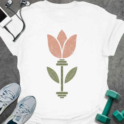 White t-shirt with an illustration of tulip flowers surrounding a barbell in coral and green