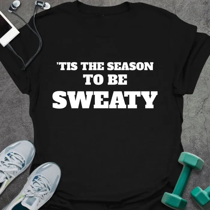 Black t-shirt printed with "'TIS THE SEASON TO BE SWEATY" in white