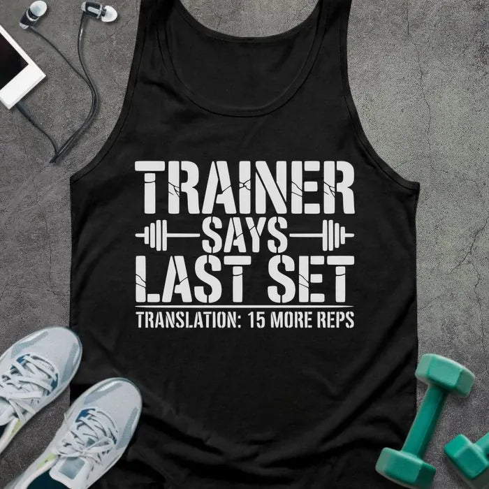 Black tank top printed with "Trainer Says Last Set Translation: 15 More Reps" in white