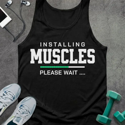 Black tank top printed with "Installing Muscles Please Wait ...." in white and teal, with progress bar in teal