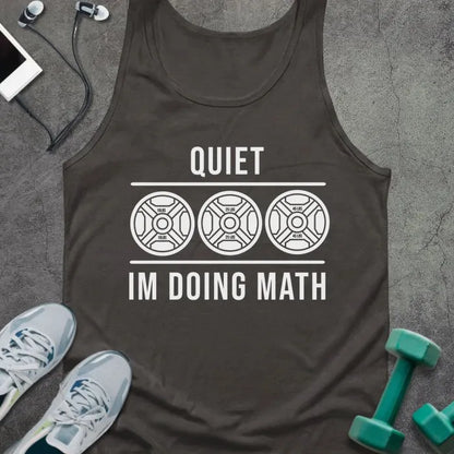 Dark grey tank top printed with "Quiet Im Doing Math" in white, with three dumbbell icons