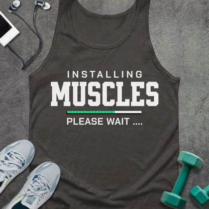 Dark grey tank top printed with "Installing Muscles Please Wait ...." in white and teal, with progress bar in teal