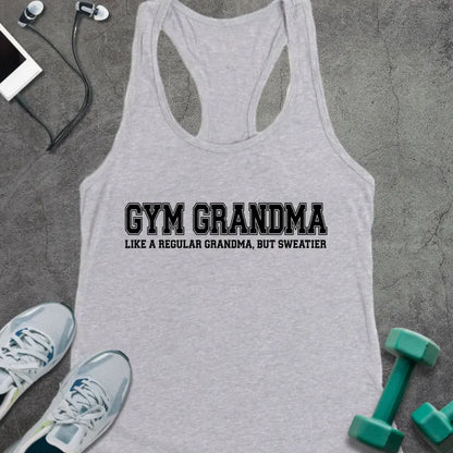 Heather grey racerback tank top printed with "GYM GRANDMA, LIKE A REGULAR GRANDMA, BUT SWEATIER" in black varsity letters