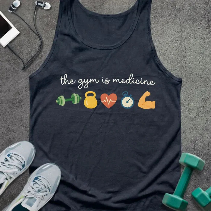 Navy tank top printed with "the gym is medicine" in white, green, yellow, orange, and blue, with kettlebell, kettlebell, weight, heart, heartbeat, and bicep icons