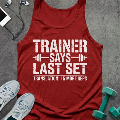 Red tank top printed with "Trainer Says Last Set Translation: 15 More Reps" in white