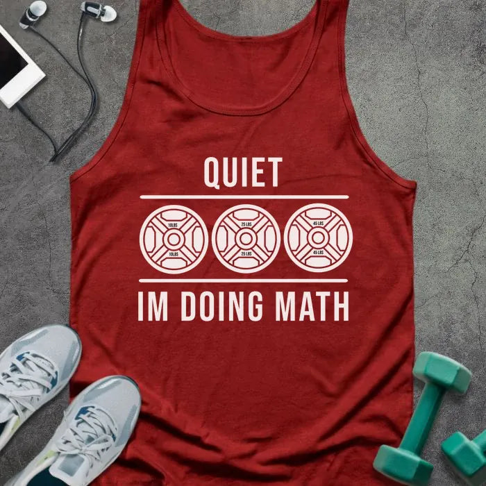Red tank top printed with "Quiet Im Doing Math" in white, with three dumbbell icons
