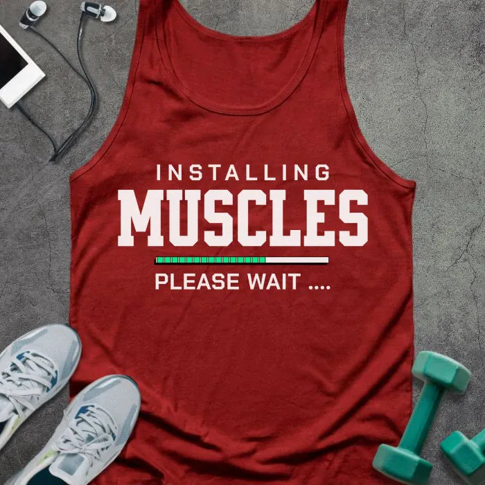 Red tank top printed with "Installing Muscles Please Wait ...." in white and teal, with progress bar in teal