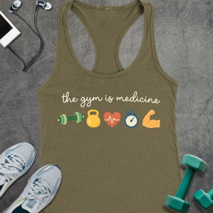 Military green tank top printed with "the gym is medicine" in white and multicolor, with colorful gym icons including dumbbells, kettlebell, heartbeat, and flexed arm