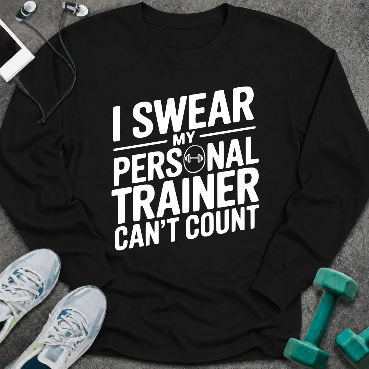 Black long sleeve tee printed with "I Swear My Personal Trainer Can't Count" in white, with a dumbbell set into the lettering