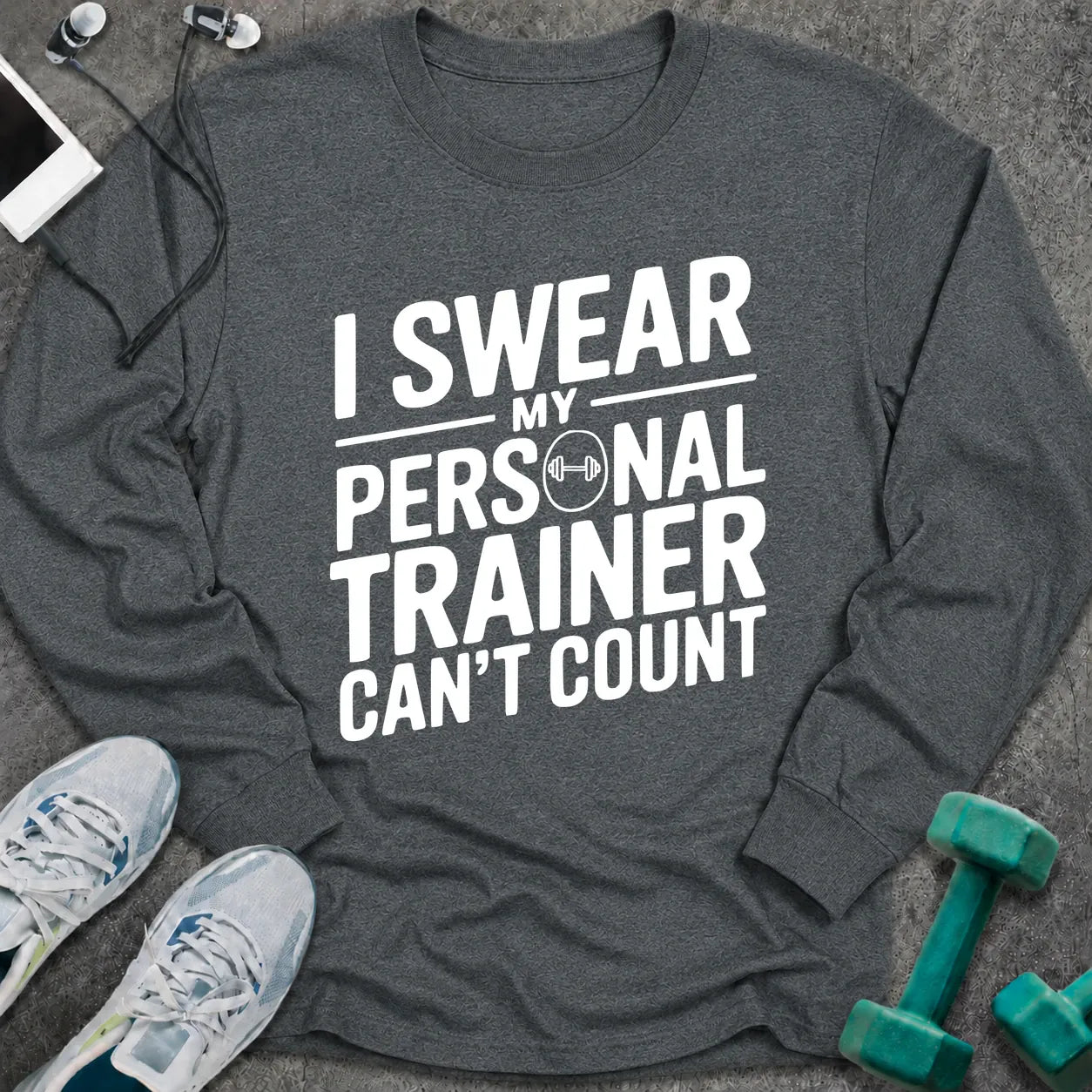 Dark heather long sleeve tee printed with "I Swear My Personal Trainer Can't Count" in white, with a dumbbell set into the lettering
